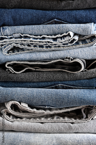 Stack of folded blue and gr...