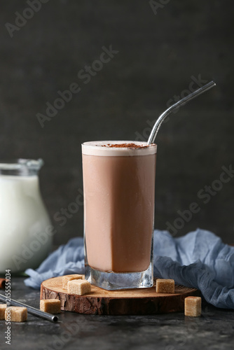 Glass of cold cocoa drink w...