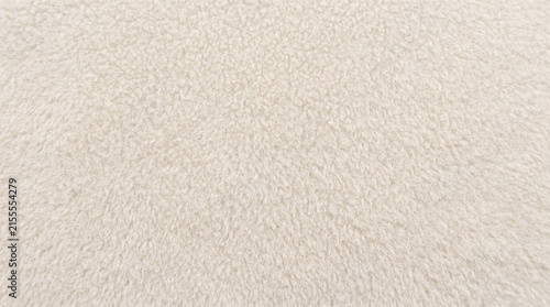 Fleece fabric texture in off-white provides a soft plush background for design.