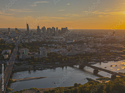 Foto Warsaw city capitol of Poland, pge stadium and Wisla river  at sunset