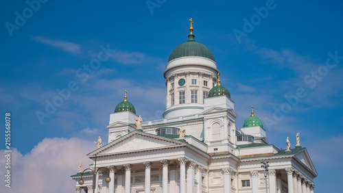Fotografie White Helsinki Cathedral domes neoclassical architecture with blue sky copy spac