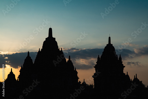 Cuadro en lienzo Silhouette of Ancient Candi Plaosan Temple Complex at Sunset in Klaten, Central