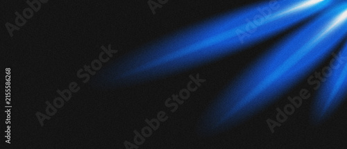 Abstract grainy gradient background blending deep blue and black tones, creating a dynamic and vibrant. Noise texture design.
