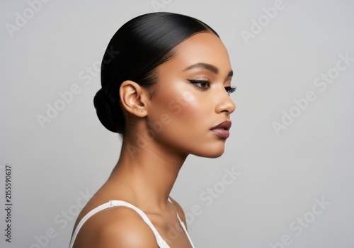Portrait of a beautiful woman with sleek hair and natural makeup