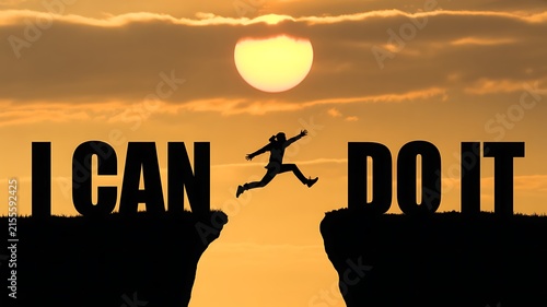 Silhouette of Person Jumping Across Cliff Gap with I Can Do It Text at Sunset
