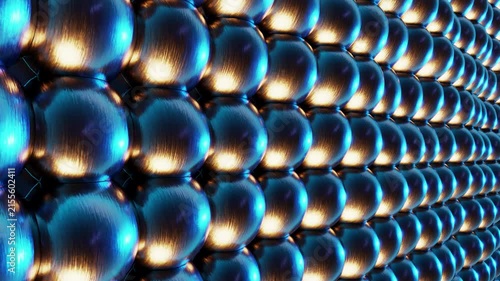 Abstract 3D rendering of metallic brushed spheres array wall moving in a seamless loop. Sci-fi futuristic grid background with metallic blue and warm golden lighting reflections for motion graphics, V