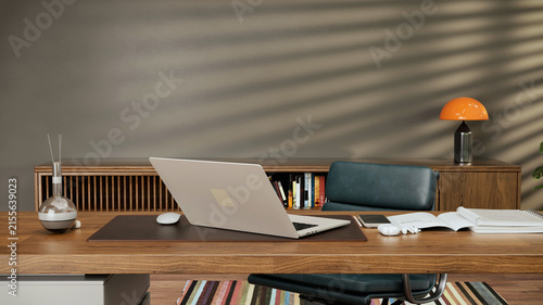 Warm Home Office Desk with Laptop and Dramatic Sunlight Shadows