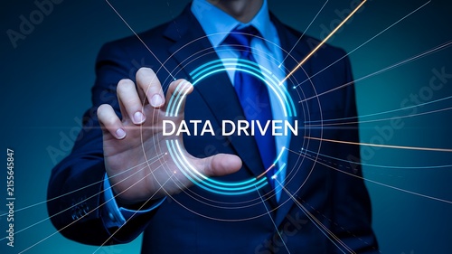 Data driven business concept with professional interacting with digital analytics interface