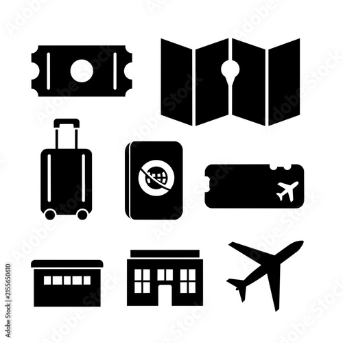 A collection of black silhouette icons depicting travel essentials including luggage and.