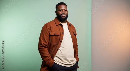 Confident Plus Size Black Man Smiling in Studio Portrait