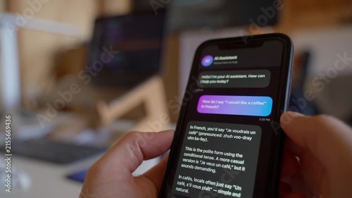 Asking AI assistant how to say a phrase in French on smartphone close-up