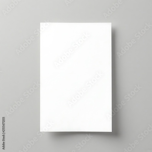 Minimalist white blank card on soft gray studio background for product display.