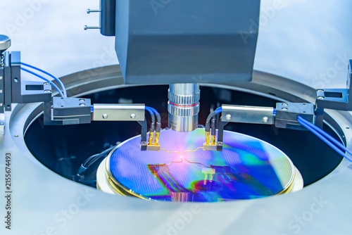 silicon wafer with needles for test of semiconductor on the probe station,examining a sample of microchip transistor,integrated circuits to manufacture CPU and GPU