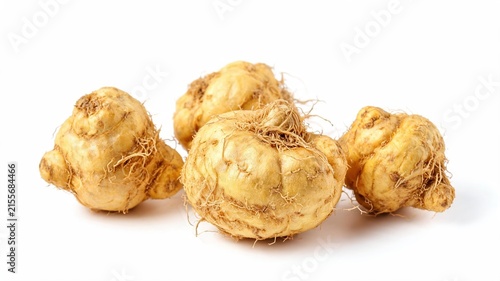 Group of yellow maca roots isolated on white