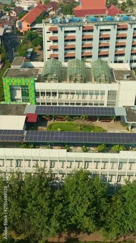 Rooftop solar panels on urban building in Yogyakarta