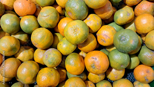 Фотография Fresh oranges fruit at the market