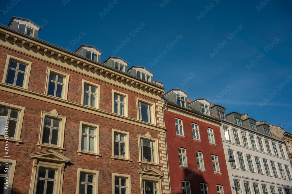 Fototapeta premium Stunning Architectural Facades Under a Clear Blue Sky