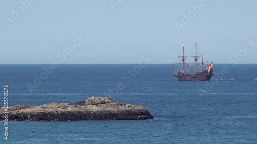 Historic Galleon with Spanish flag sailing close to the coast of Ireland in County Donegal