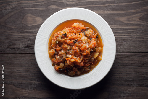 Stewed zucchini diced with onions, carrots, tomatoes and basil