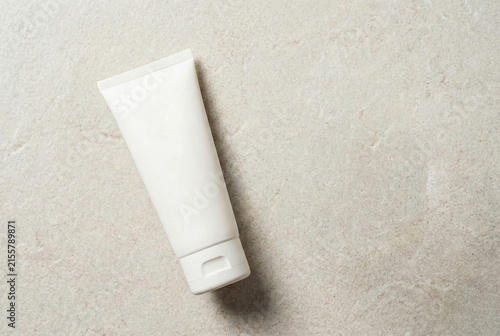 Minimalist Style Showcasing White Tube With Earthy Textured Surroundings