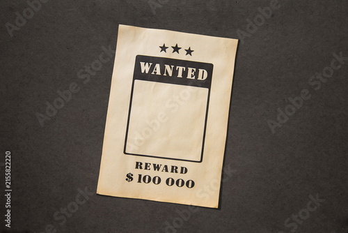 wanted poster on dark background