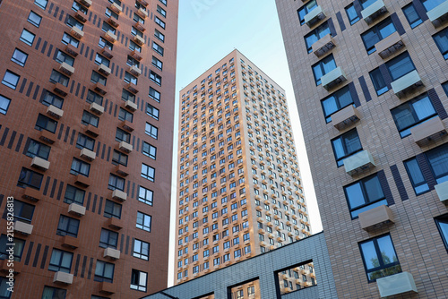 New residential buildings with boxes for air conditioners. House development, high-rise construction