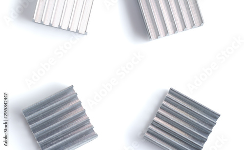 Konstfotografi Metallic cooling fins arranged neatly on a clean white background