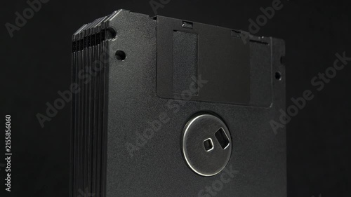 Black floppy diskettes. Floppy disk, diskette, or floppy diskette - type of disk storage made from a thin, flexible disk coated with magnetic storage medium