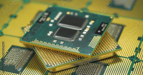 Central processing units with chip sets and golden pins and contacts for a personal computer, essential for computing tasks