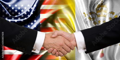 Handshake between the United States and the Vatican, international friendship, background with flags. Flags.