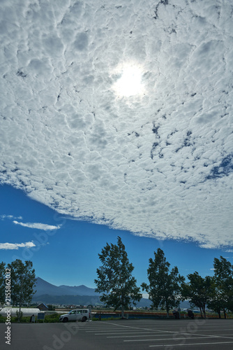 Dramatic White Cloud Formation Across Blue Summer Sky