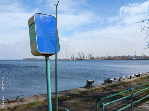 Obraz na plátne Blue marking sign set at the edge of passenger pier of Dnipro river port of Zapo