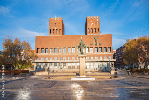 Photography Symmetric Oslo City Hall building facade under blue sky with copy space
