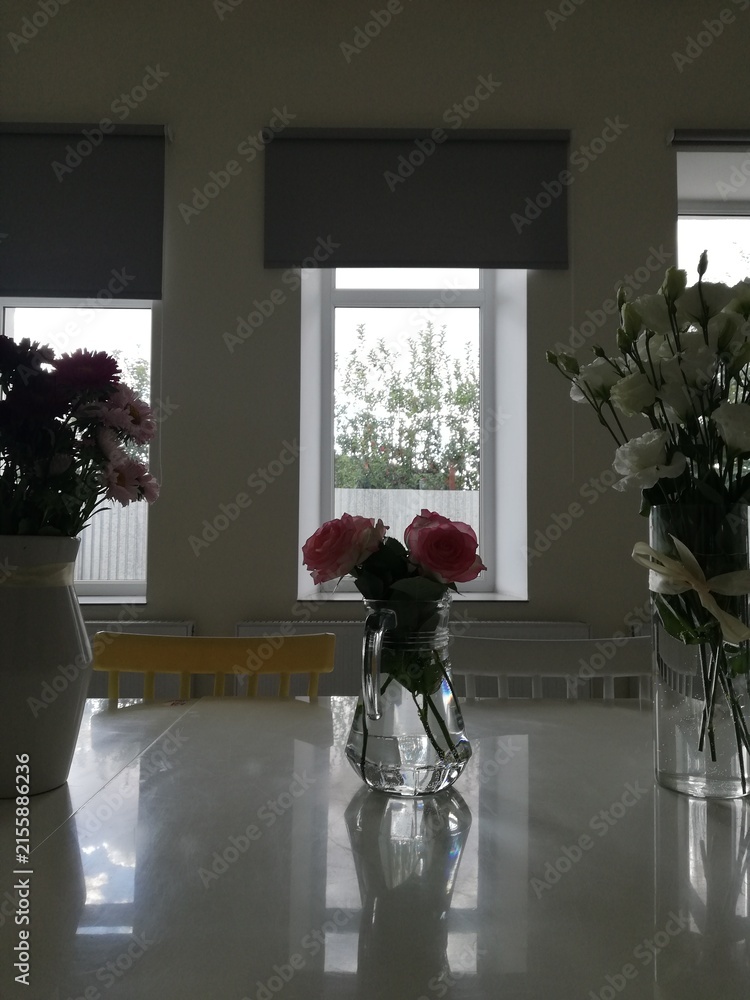Fototapeta premium flowers in a window