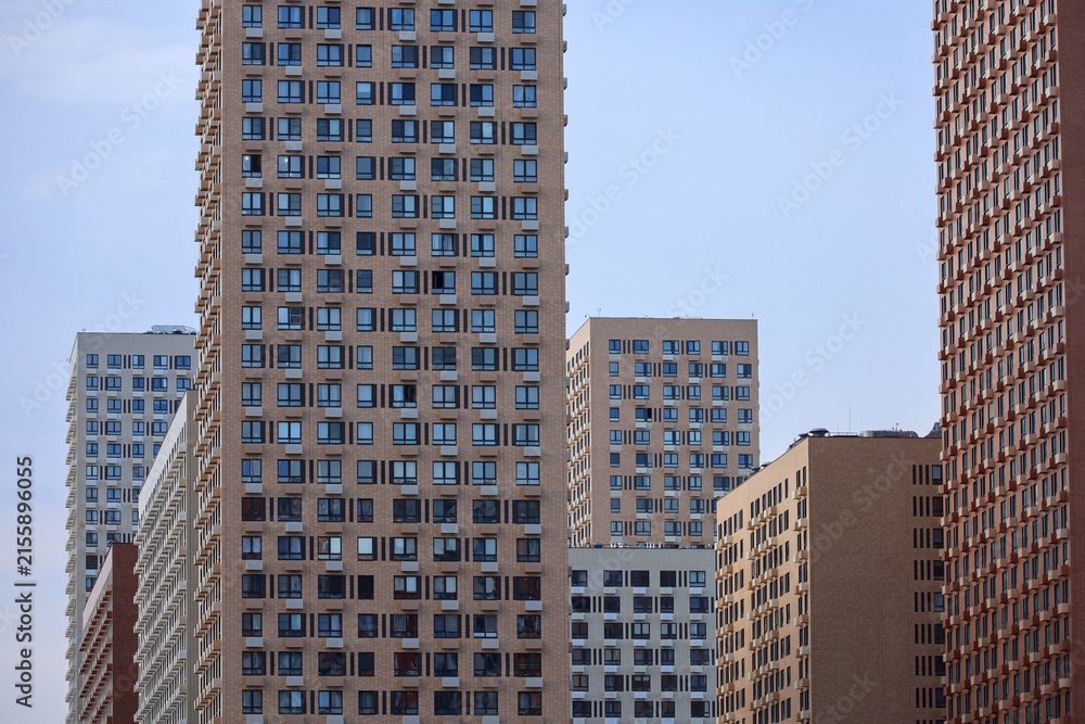 Fototapeta premium New residential buildings. House development, real estate, high-rise construction