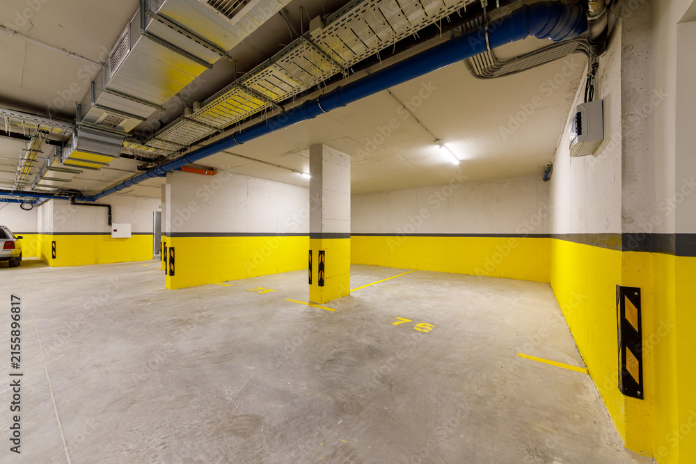 Fototapeta premium Underground Parking Garage. Modern Infrastructure for Mobility, Safety, and Urban Planning Concepts