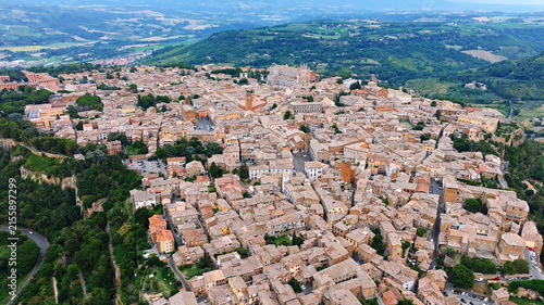 Фотография High altitude aerial drone view of Orvieto old town historic medieval center den
