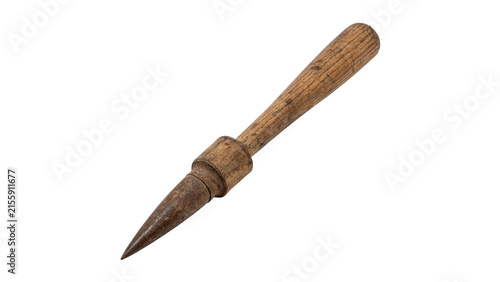 Fotografie Ancient wooden handle awl or piercing punch tool isolated on a white background