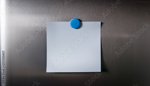 empty sheet of paper on fridge door with magnetic note