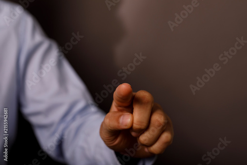 Photography Business professional pointing index finger forward in decisive action