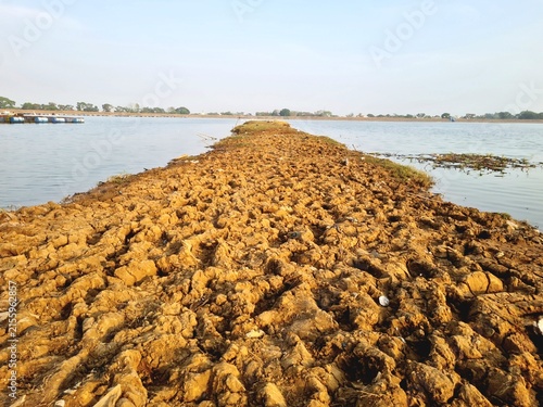 фотографія Land exposed as reservoir water recede due to long dry season,location in Mulur Reservoir, Indonesia