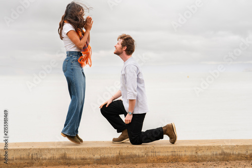 excited couple marriage proposal 