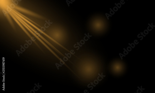 Golden light rays shining from corner on deep black background