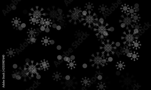 White winter snowflakes falling on dark night background