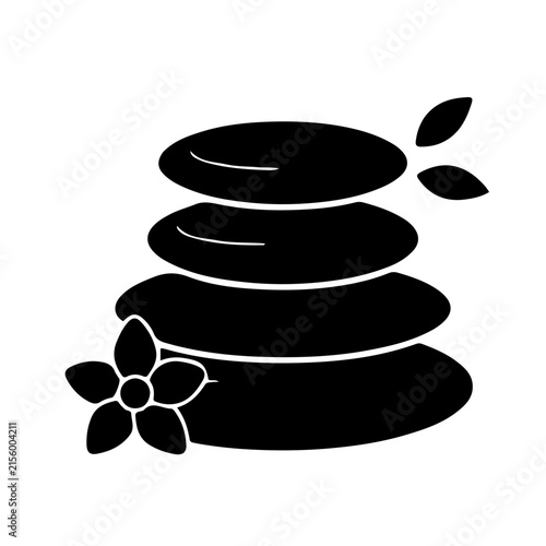 set of black and white spa stones with flower