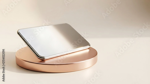 Chrome payment card on minimalist white pedestal