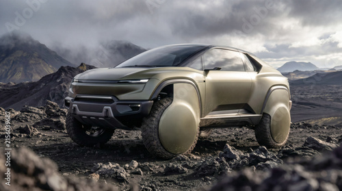 Futuristic electric SUV exploring rugged volcanic terrain beneath dramatic mountain clouds.