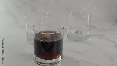 Adding ice into soda. Original sound. 24fps. Prores 422HQ