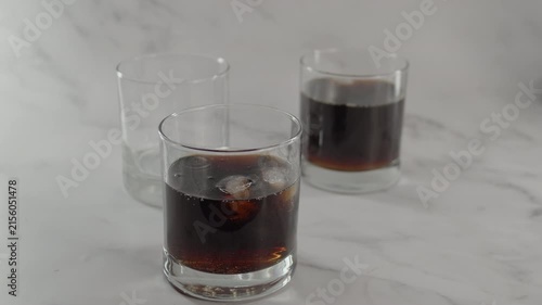 Bubbles popping in glass of soda. Original sound. 24fps. Prores 422HQ