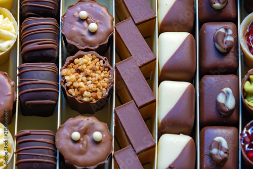 Chocolate nuts praline cakes arranged in box